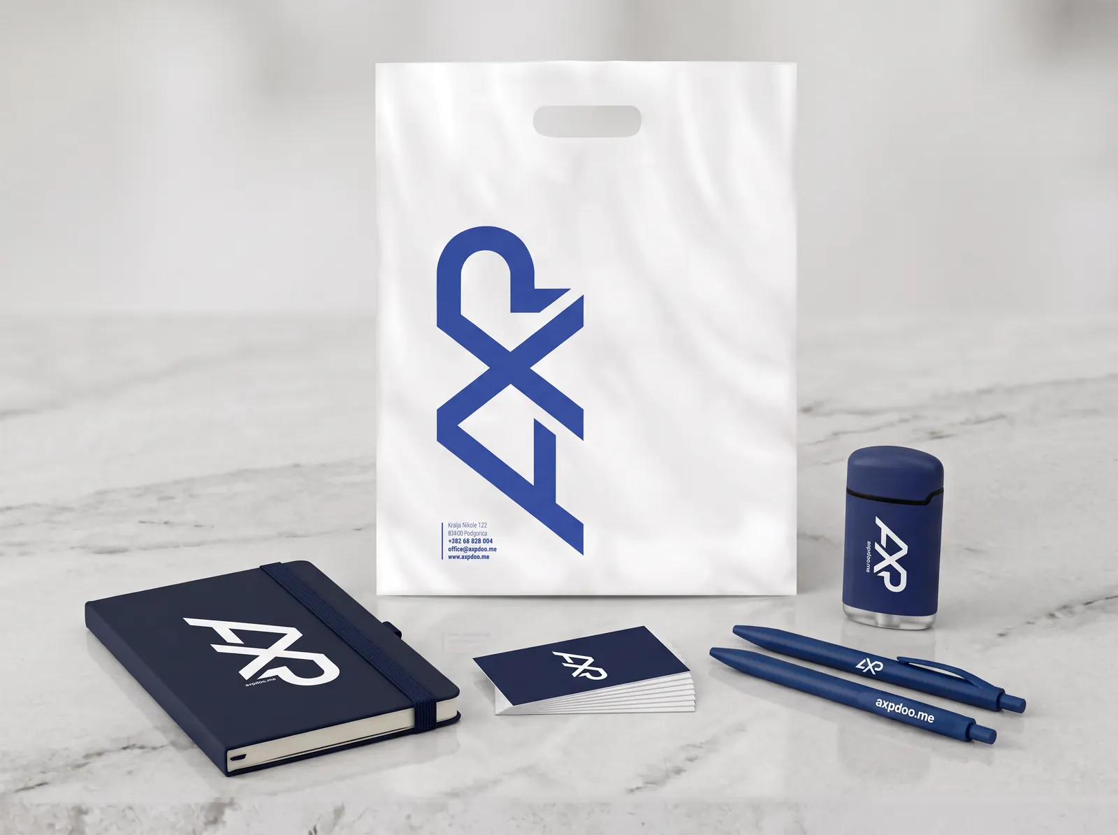 AXP — brendirani notes, vizitke, olovke, upaljač i kesa sa logotipom
